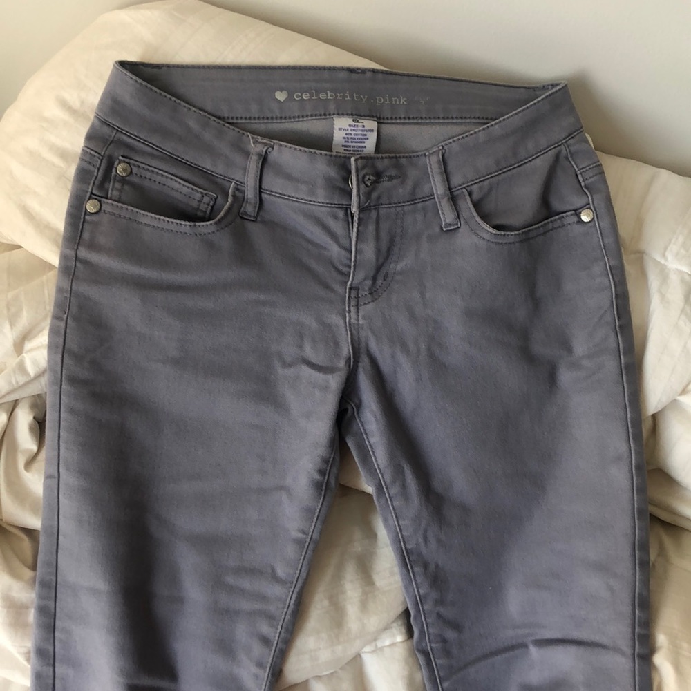 Grey low rise jeans.